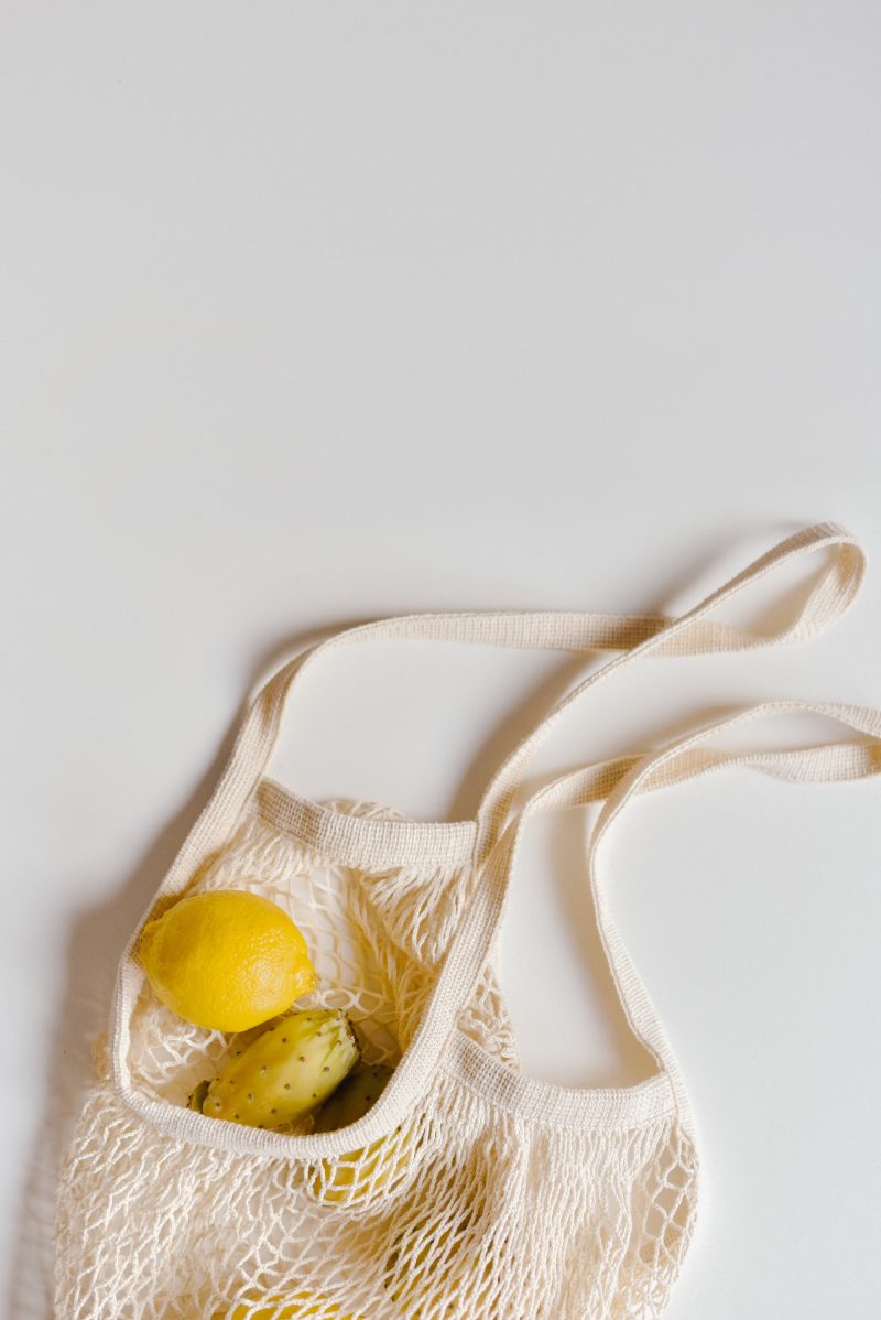 Yellow fruit in mesh bag