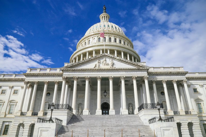 Photo of US Capitol with blue sky