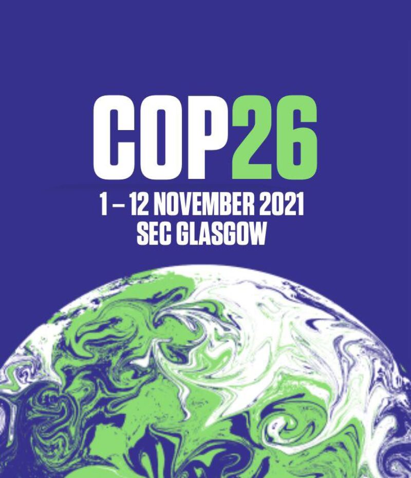 Earth in green and white with COP 26 logo November 1-12, 2021 and Glasgow