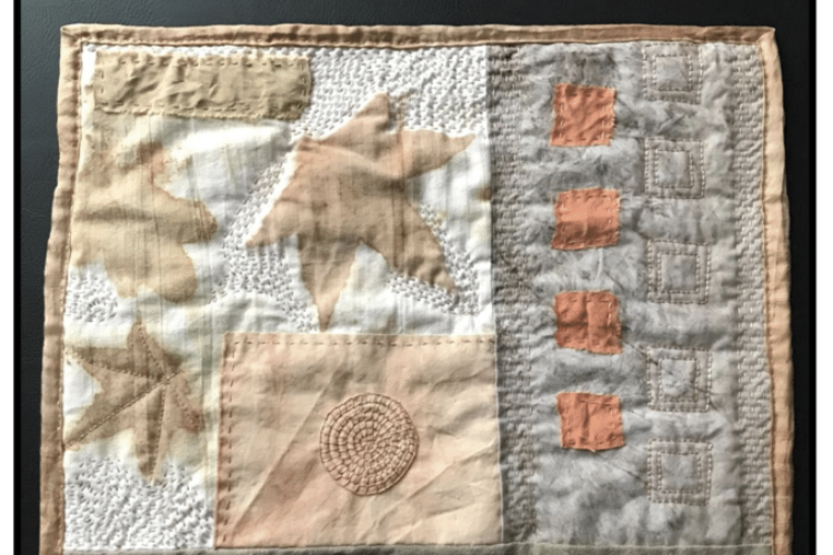 Wool quilt with stars and swirls