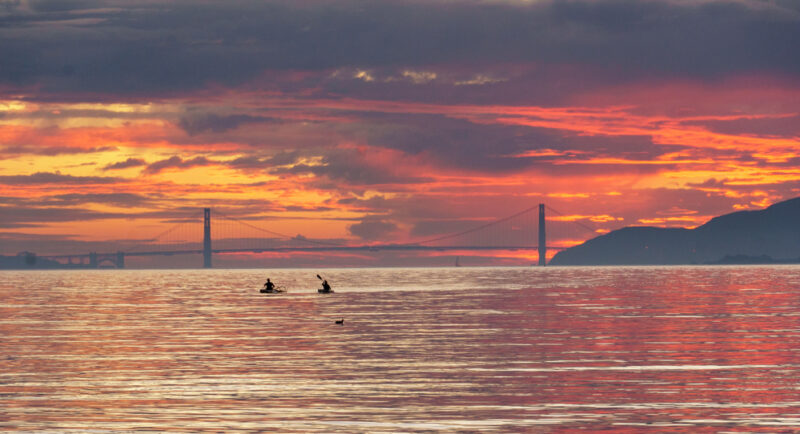 Kayakers at sunset, Albany Bulb, California