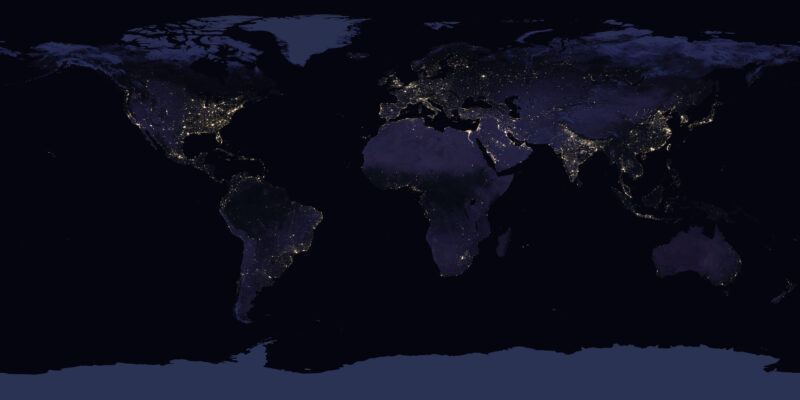 Earth at night with light visible more from the Northern half of the hemisphere