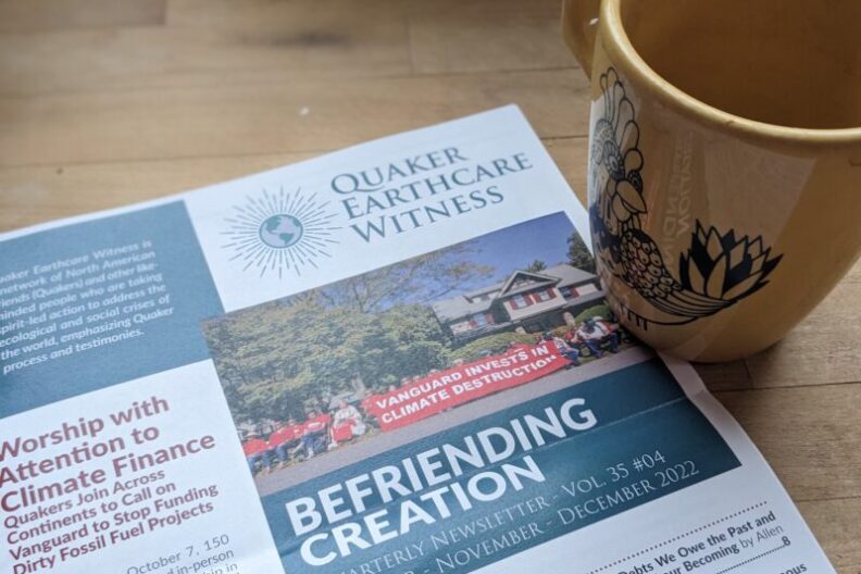 Cover of BeFriending Creation on wood table with yellow mug.